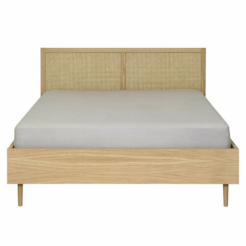 Vue de profil du lit en cannage Stella avec un cadre de tête de lit en chêne massif 